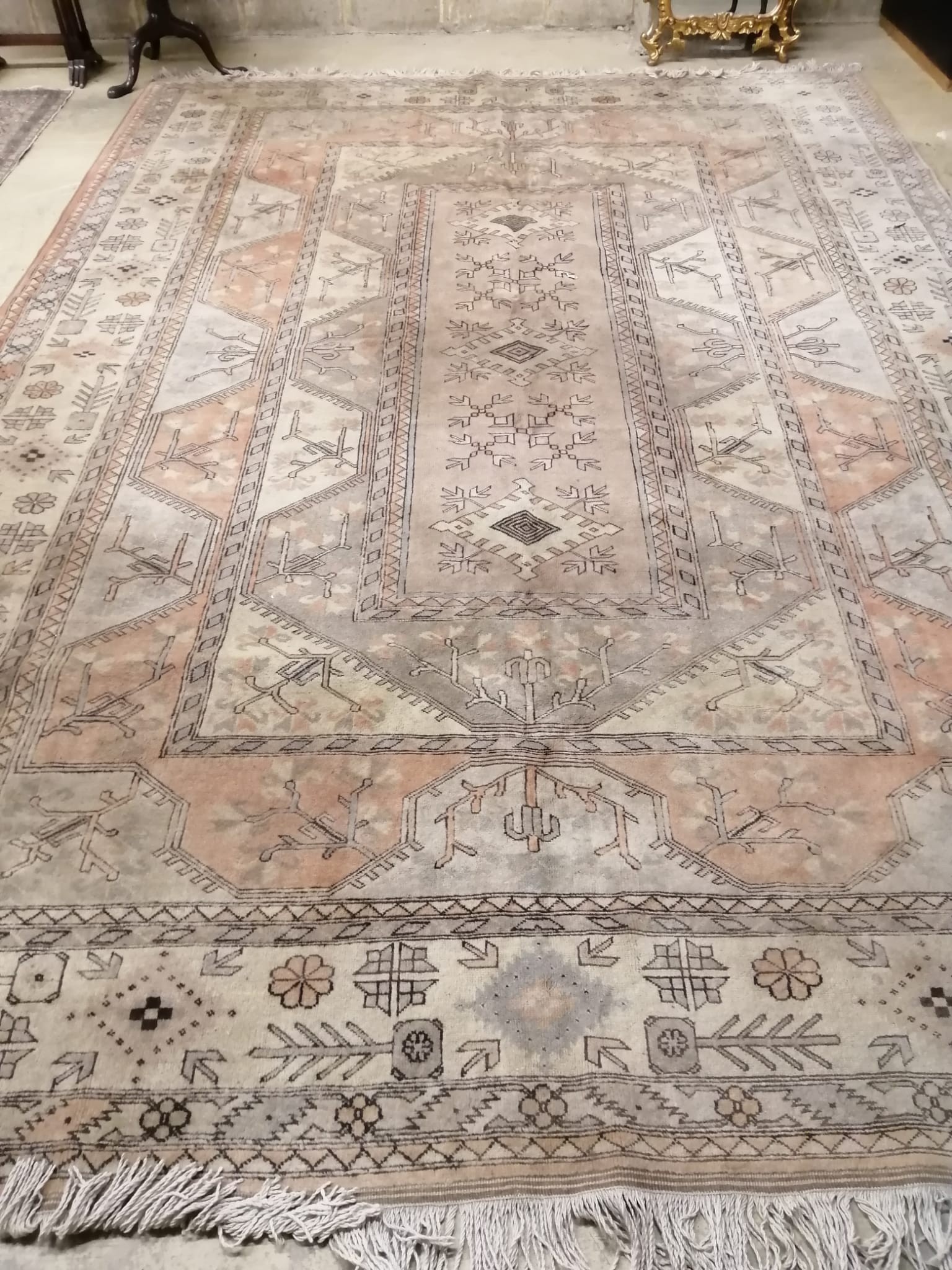 A large Caucasian Turkish design fawn ground rug, 420 x 300cm